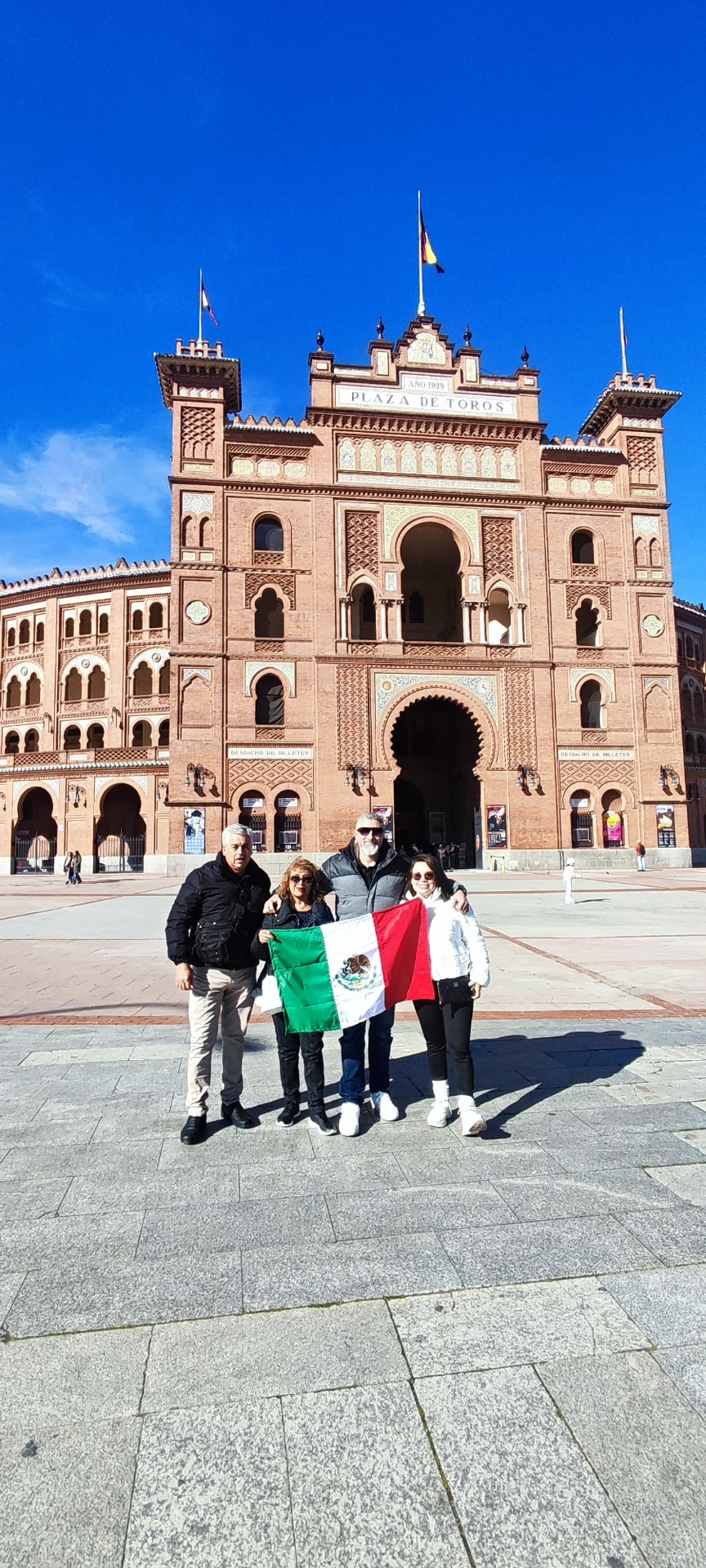 Happy guests in front of Las Ventas bullring in Madrid